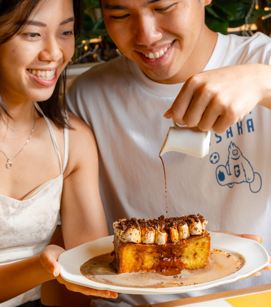 Pouring syrup on brunch
